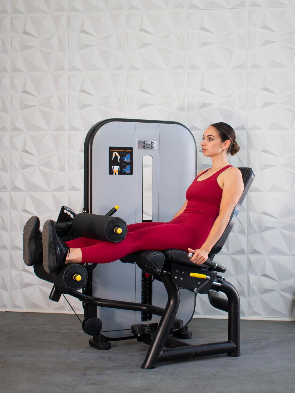 Vogue Selectorized Leg Extension/Seated Leg Curl by Muscle D Fitness